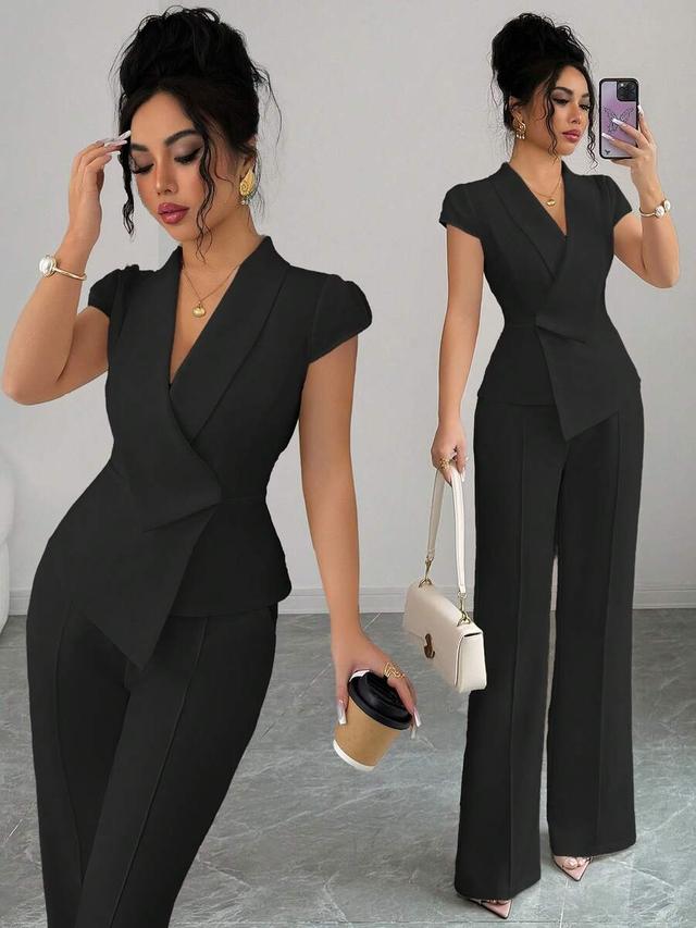 black asymmetrical collar blouse and wide leg trousers set