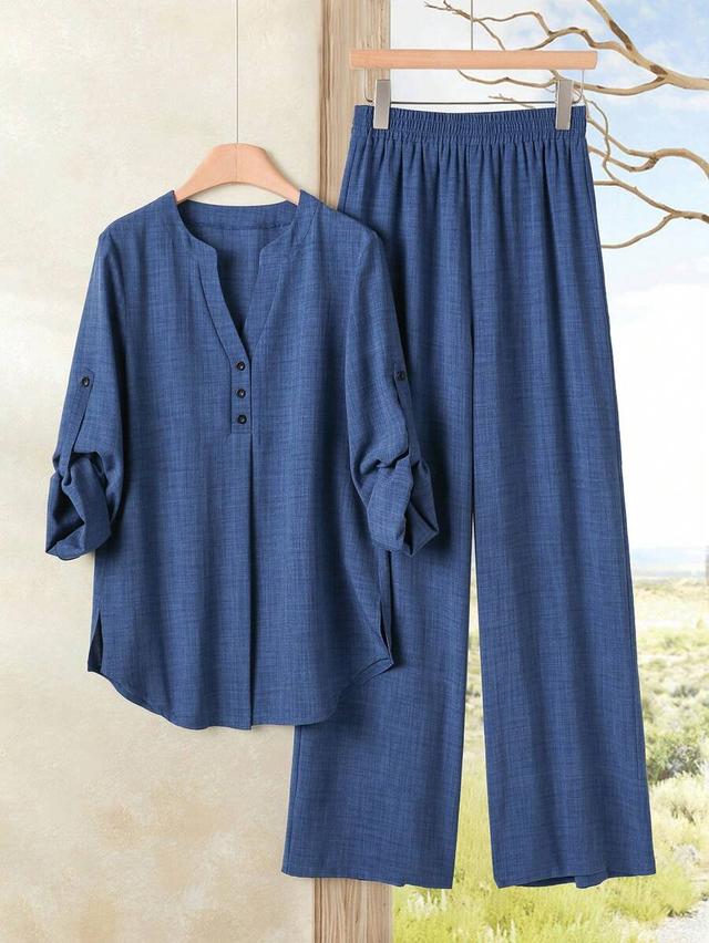 slate blue button placket roll sleeve top