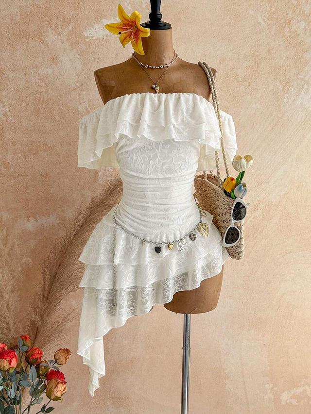 white off-shoulder ruffled mini dress with jacquard texture