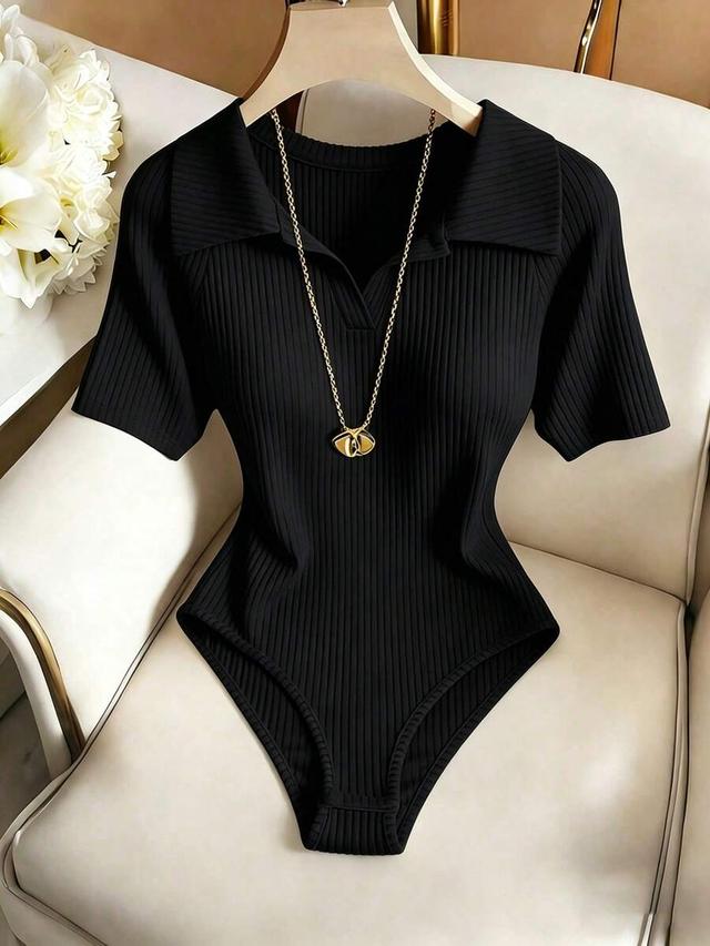 black ribbed collared short sleeve bodysuit