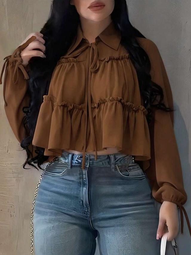 women's brown woven asymmetric pleated hem lantern sleeve shirt