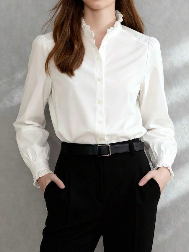 elegant white shirt with ruffle collar and cuffs