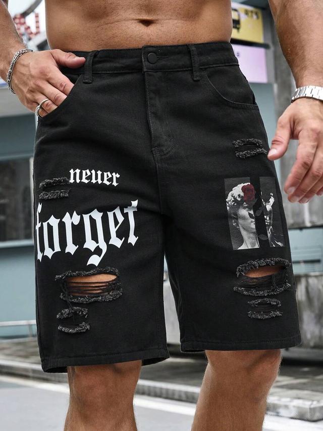 black denim shorts with graphic print and distressing