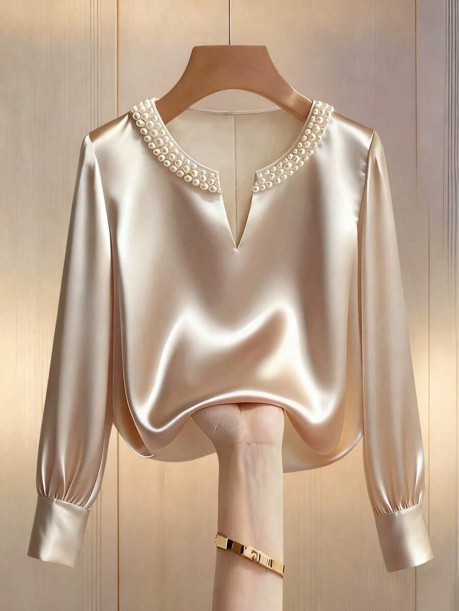 champagne satin v-neck blouse with pearl embellishment