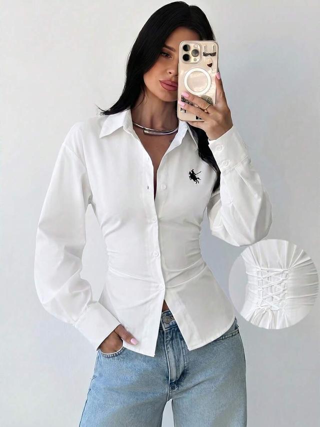 white long sleeve tie-waist button-up shirt