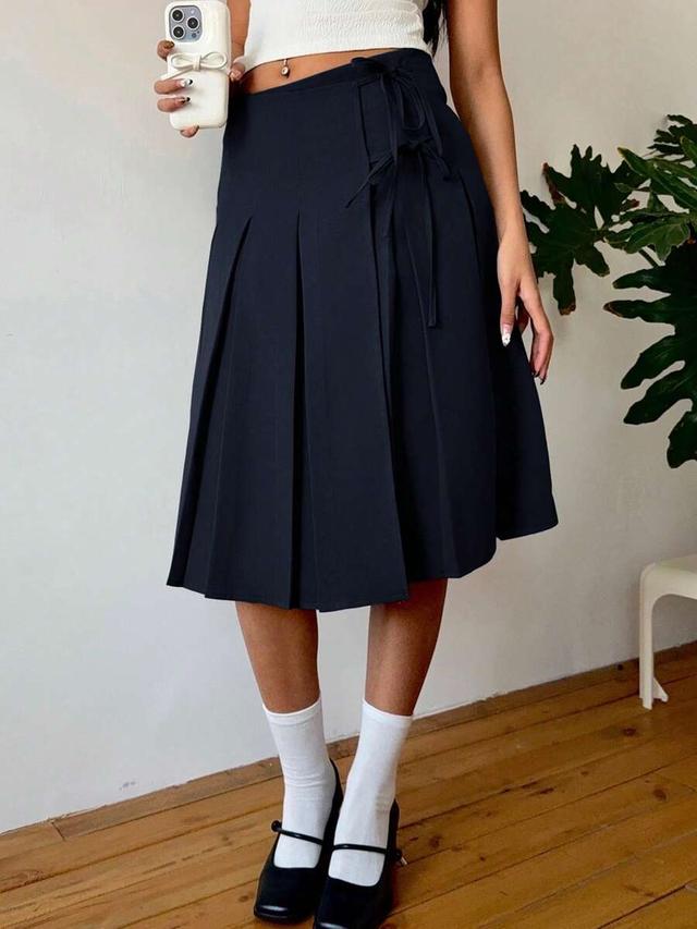 navy blue midi pleated wrap skirt with bow