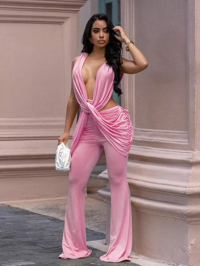 pink draped twist crop top and flare pants set