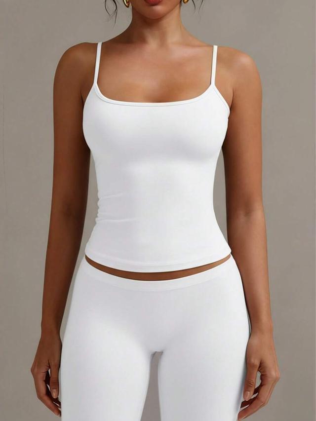 white elastic spaghetti strap camisole top