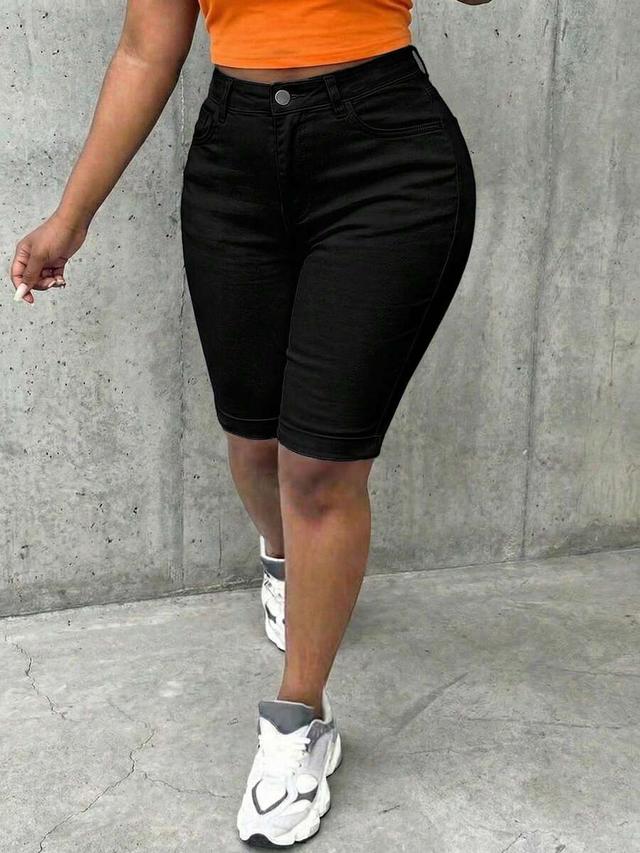 high-waisted black denim bermuda shorts