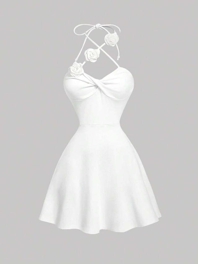 white floral halter neck fit and flare dress