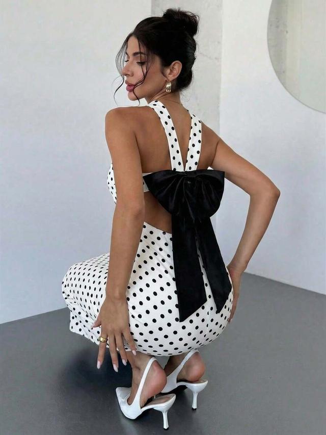 white and black polka dot backless bow tie dress