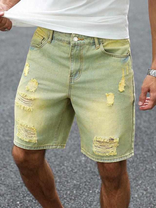 washed distressed yellow denim shorts