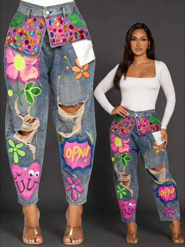 distressed denim jeans with hand-painted pop art graphics