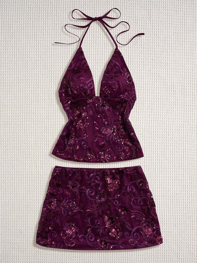 dark purple sequin camisole top and a-line mini skirt