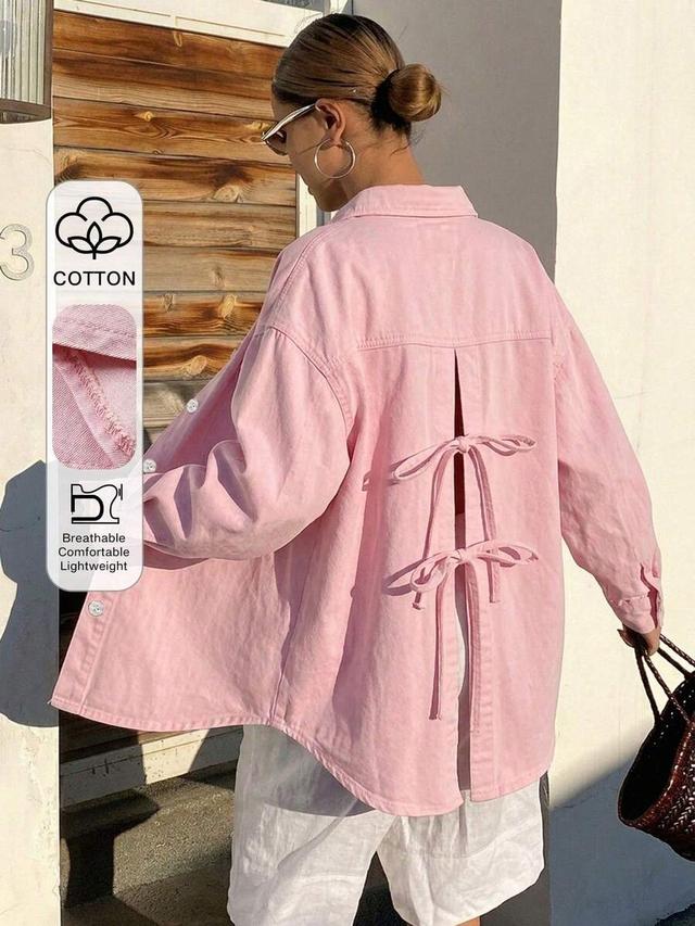 pink distressed denim shirt with back bowknot detail