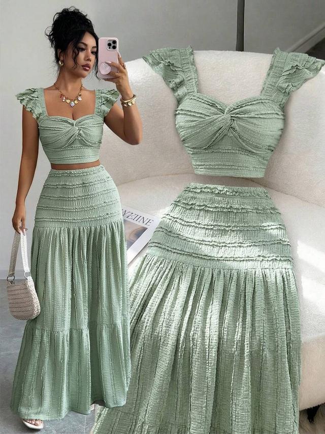green textured smocked crop top and midi skirt set