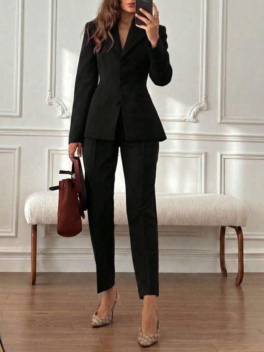 minimalist black waist-defining fitted blazer