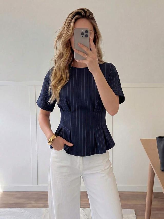 navy pinstripe round neck waist-cinched pleated hem blouse