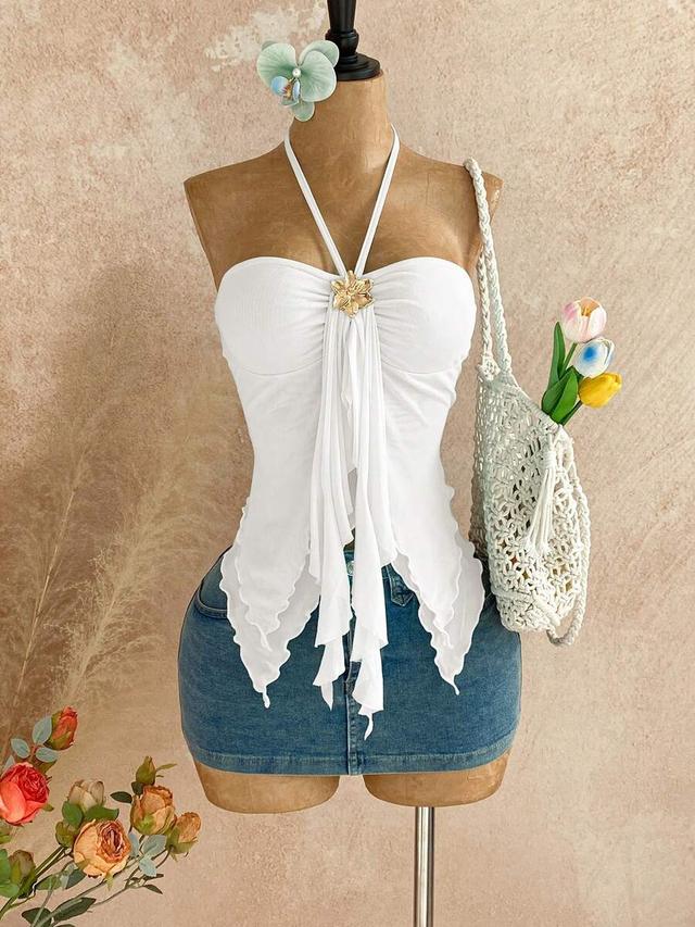 white halter top with asymmetrical hem and seashell decor
