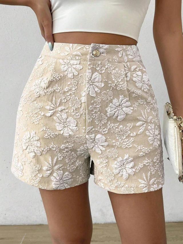 beige floral embossed pleated high-waisted shorts