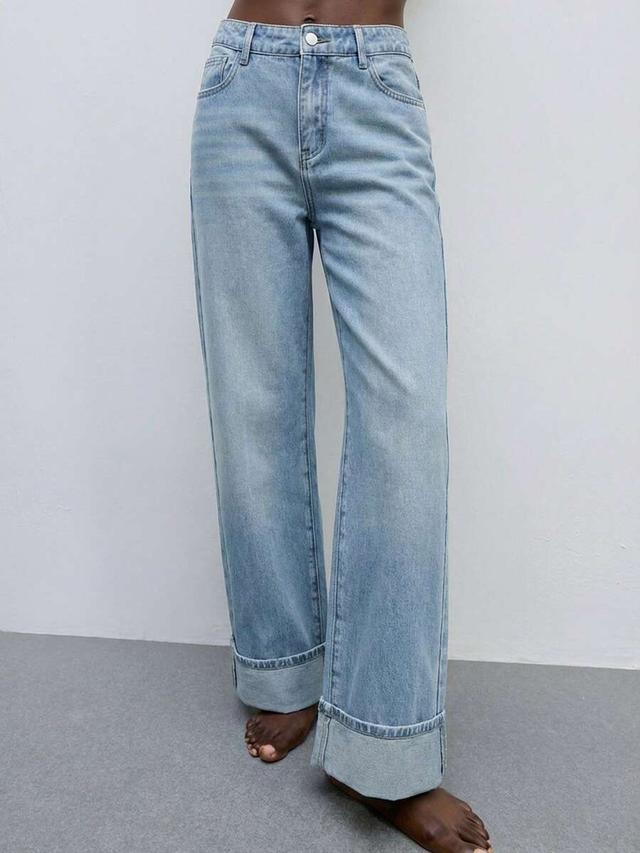 light wash denim wide leg jeans with cuffs