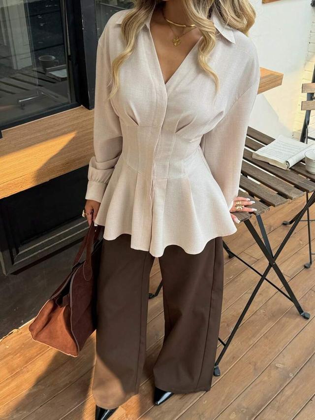 beige waist cinched a-line long sleeve peplum blouse