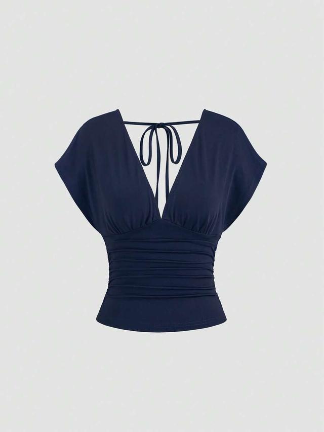 navy reversible deep v-neck ruched waist knit top