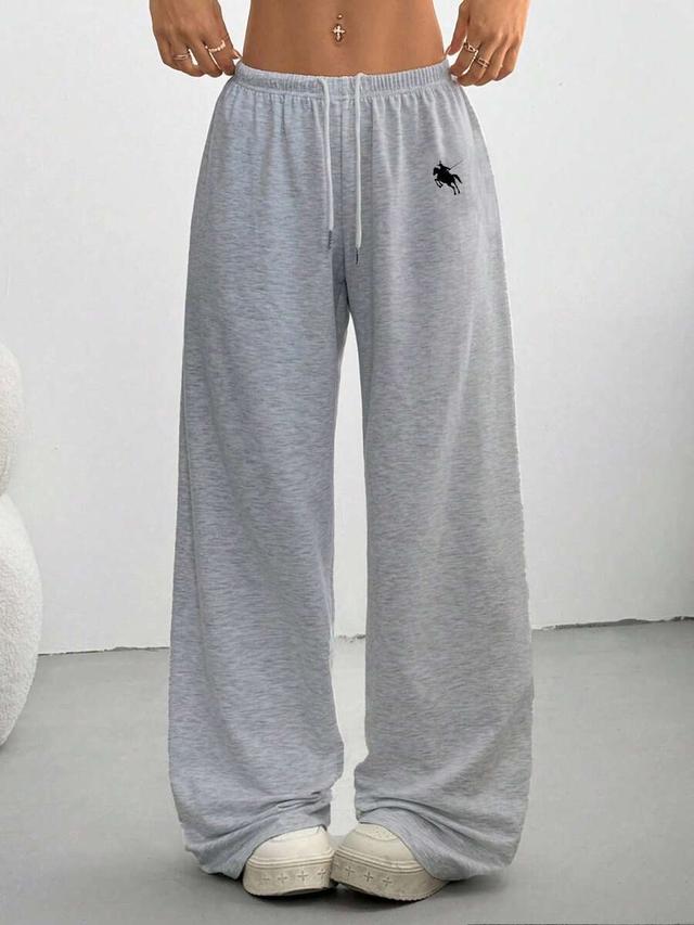 grey baggy gym sweatpants with horse logo