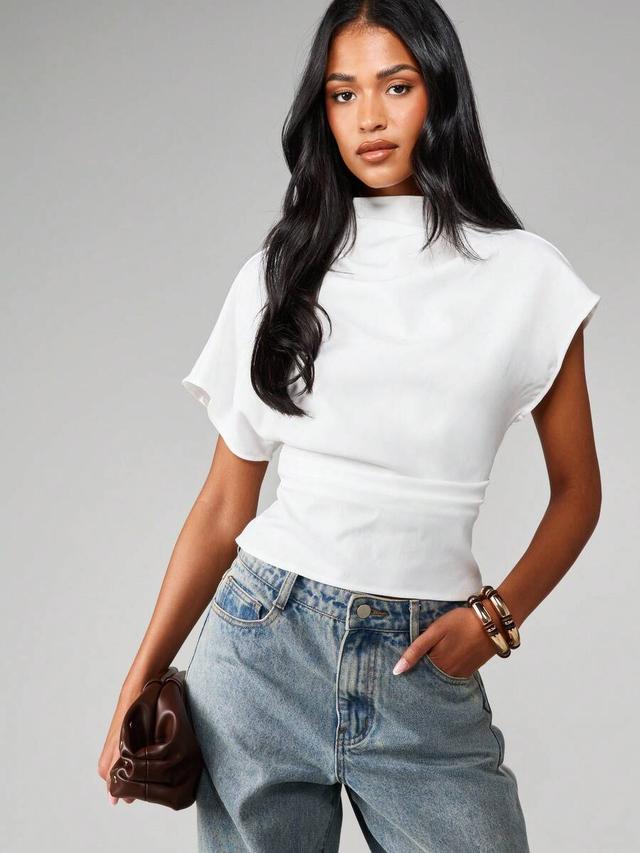 white mock neck short sleeve boxy knit top