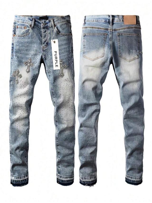 light wash stretch denim jeans with rhinestone cross embellishments
