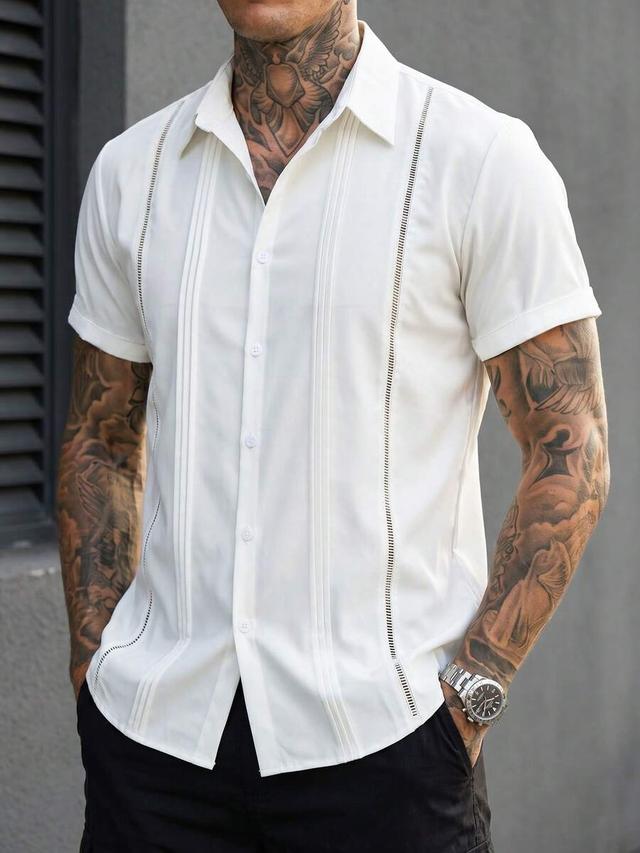 white guayabera style short sleeve casual shirt