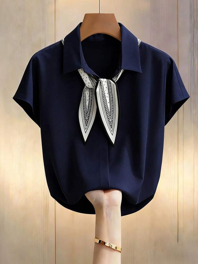 navy blue bat wing blouse with printed scarf tie