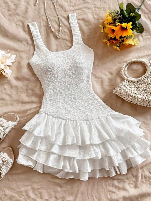 white textured smocked ruffled mini dress
