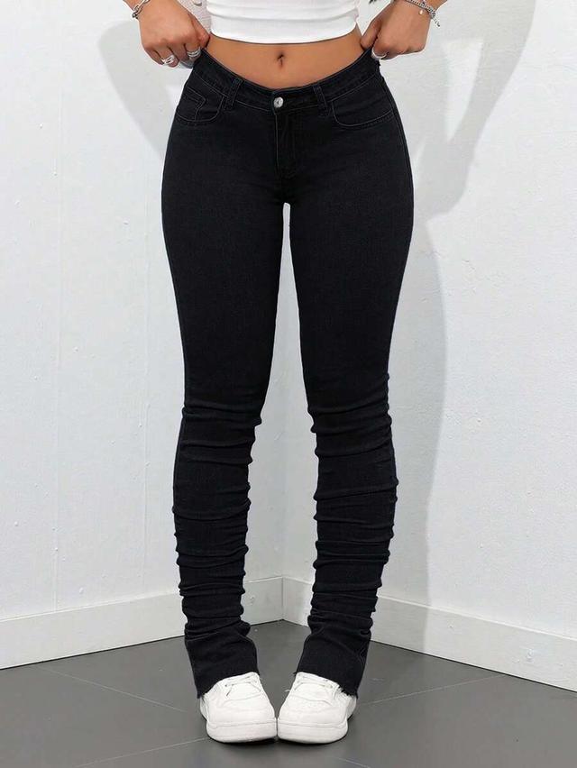 black stacked skinny denim jeans