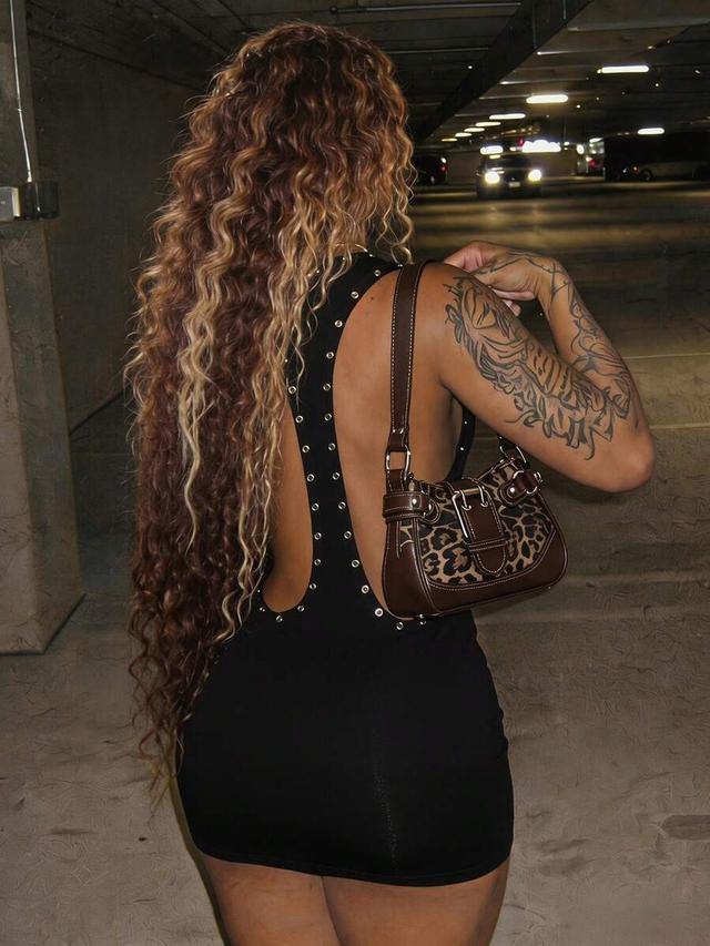 black racerback mini dress with metal eyelet detailing