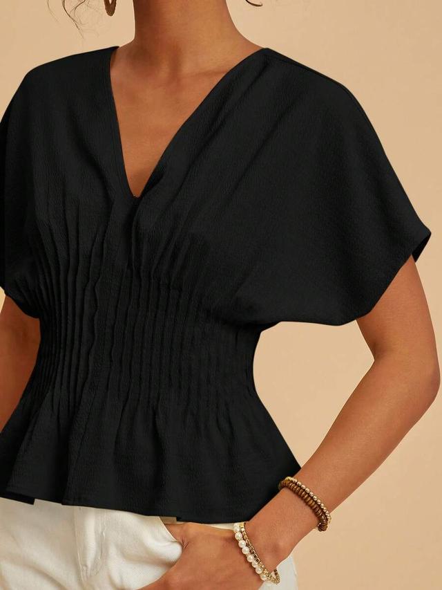 black cinched waist batwing sleeve top