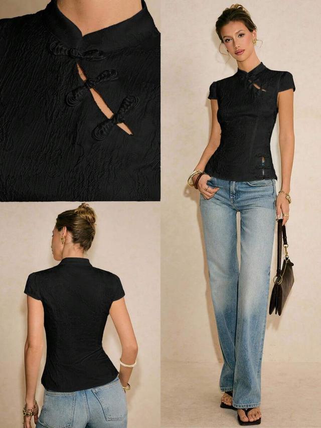 black textured waist-cinching cheongsam top