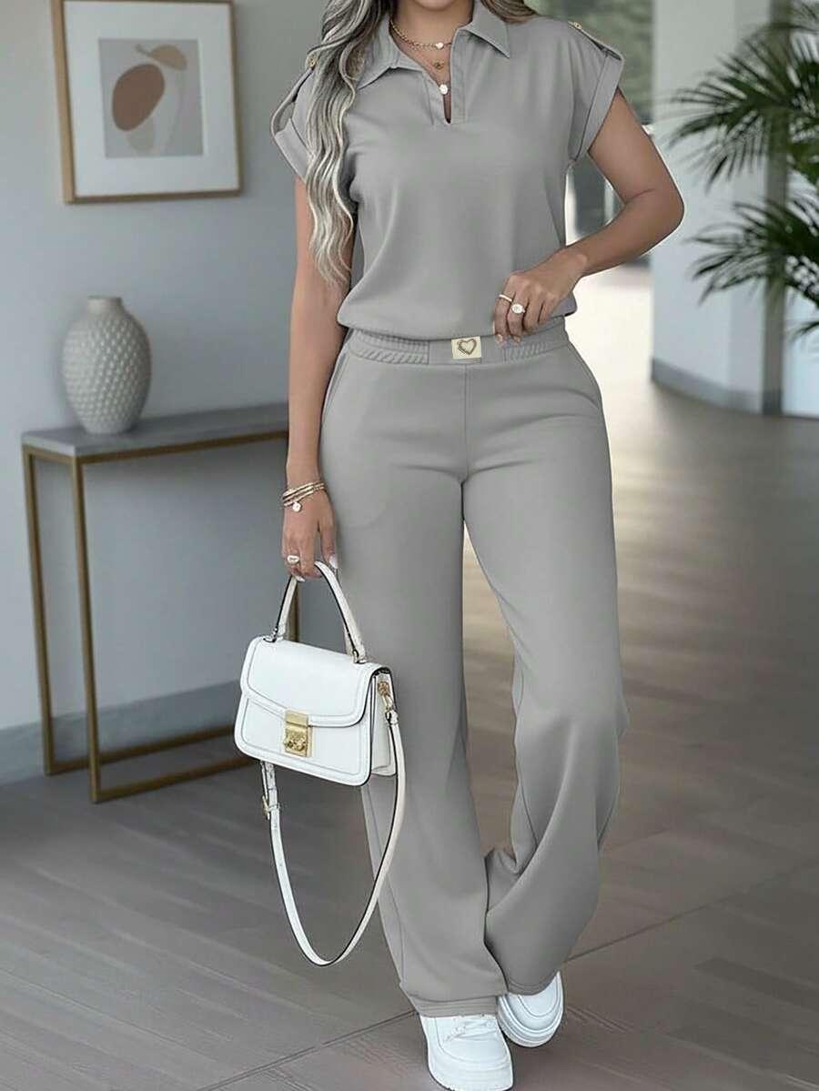 solid color short sleeve top and heart logo pants