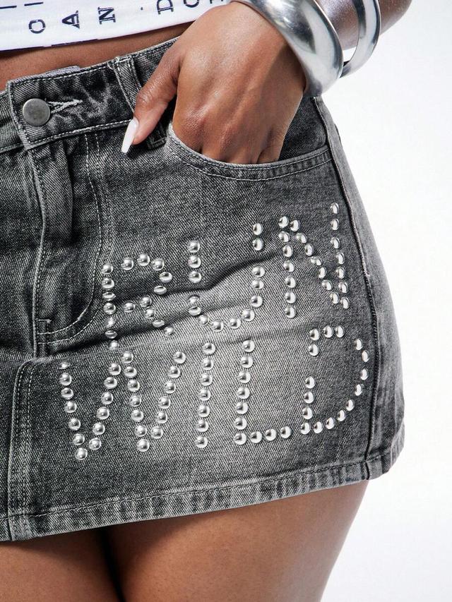 grey acid wash denim mini skirt with stud lettering