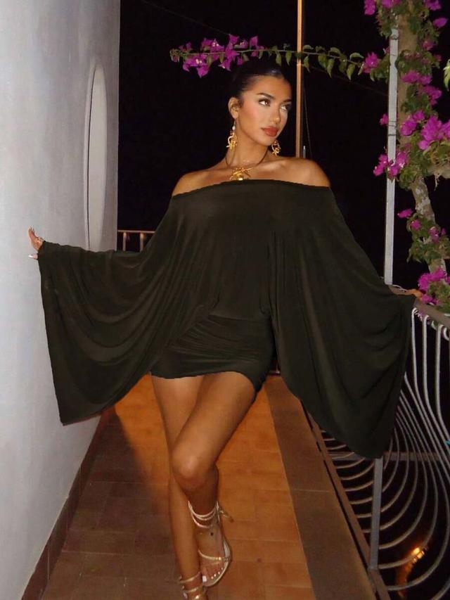 solid black off shoulder mini dress with cape sleeves