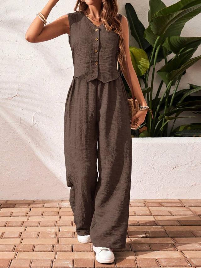 brown sleeveless button-front vest and matching wide-leg trousers