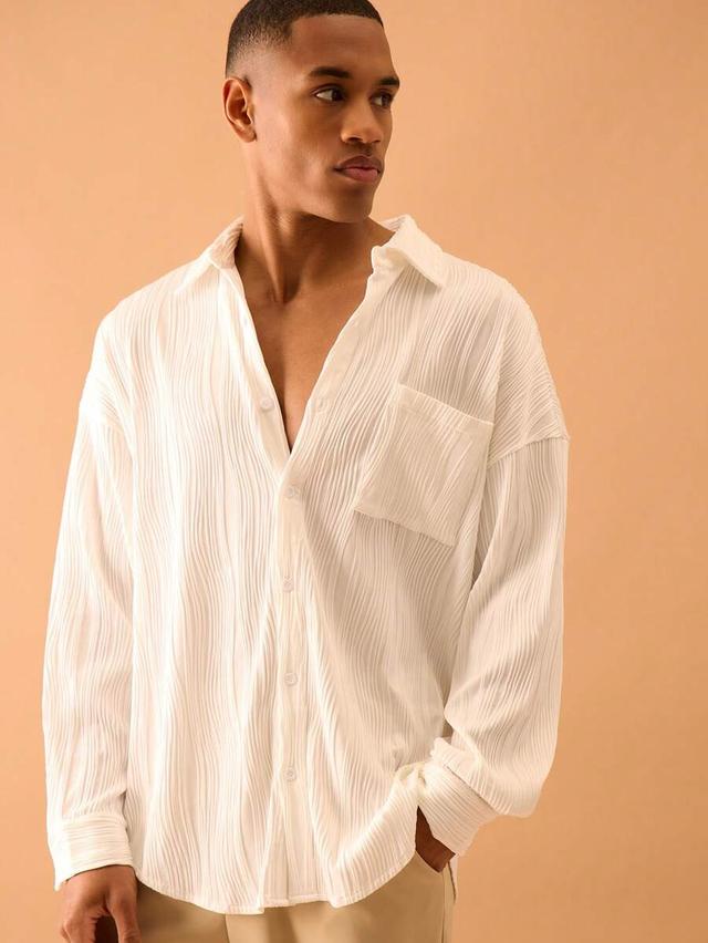 white textured plisse long sleeve button up shirt