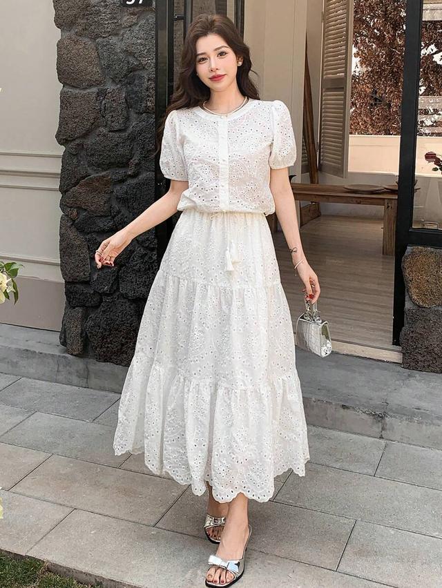 white hollow-out embroidered puff sleeve blouse and skirt set