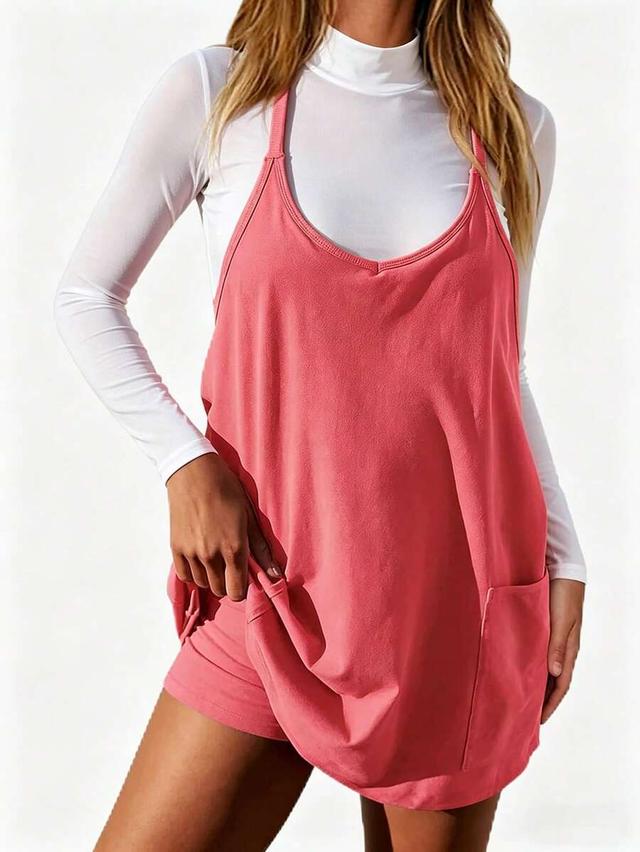 coral sleeveless athletic tennis dress with built-in shorts