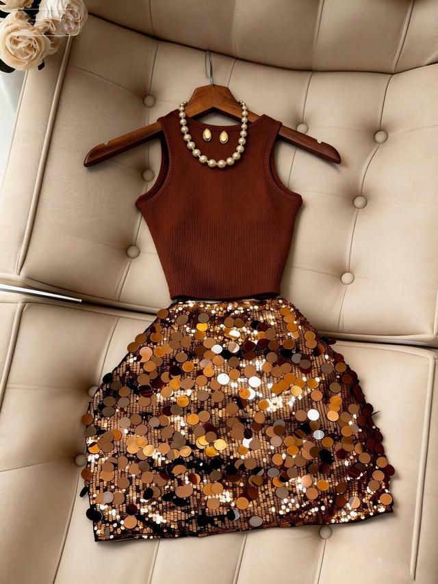 sequined bronze ribbed tank top and gold sequin mini skirt
