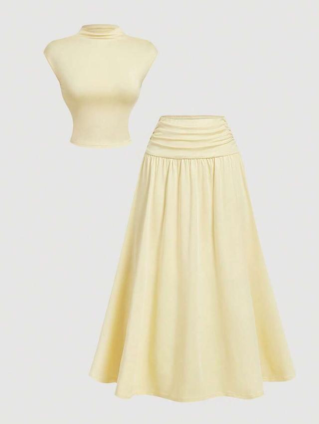 pale yellow sleeveless mandarin collar top and skirt set