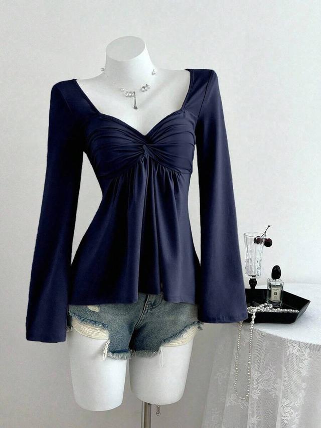 navy twist front v-neck long sleeve top