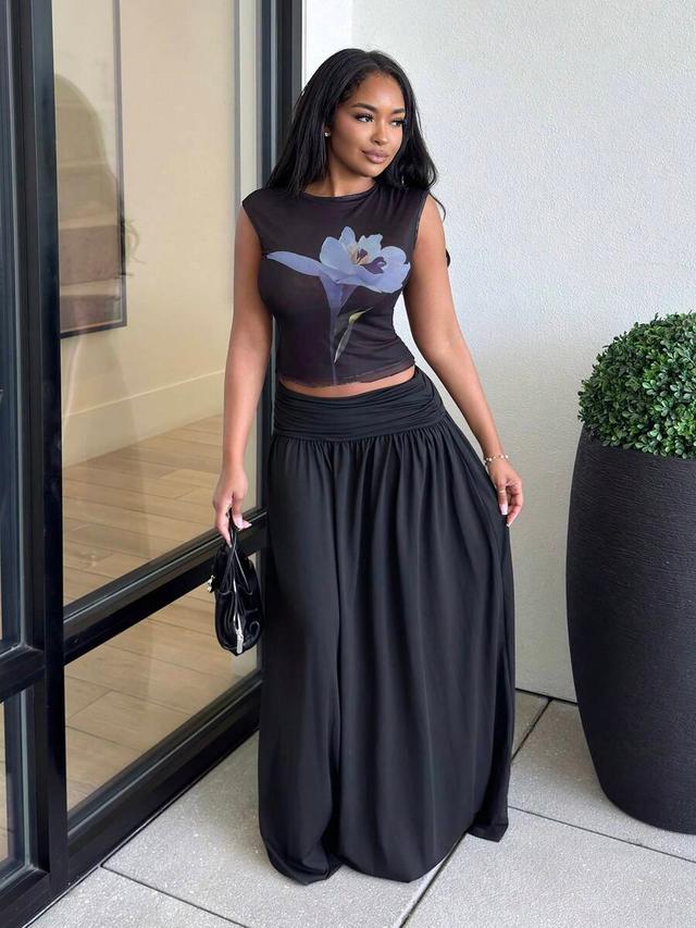 black floral flowy maxi skirt with gathered waistband