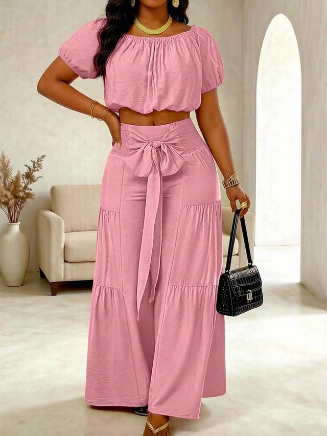 pink solid color short sleeve top and trousers set