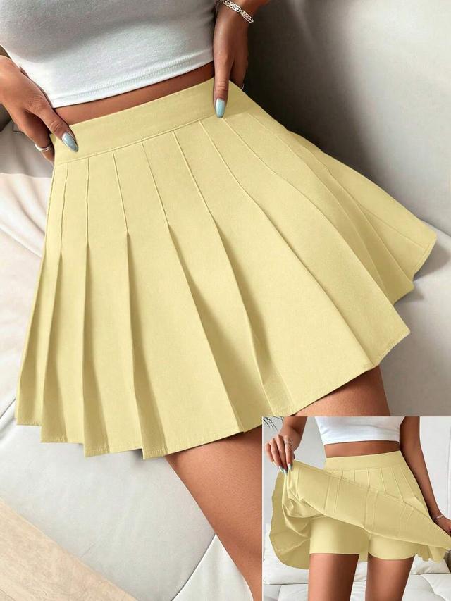 pale yellow pleated a-line skort